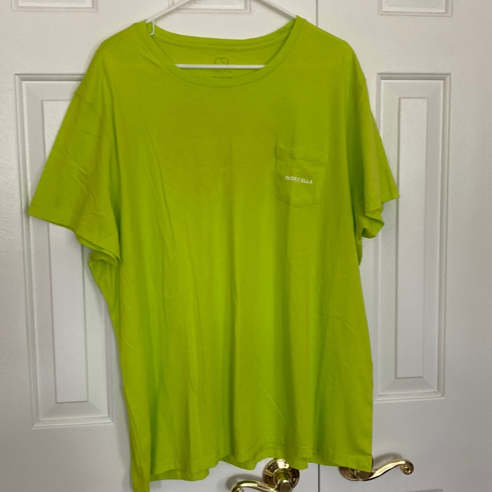 Lime green Ivory Ella tee with navy/white palm trees on elephant in back.